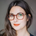Portrait-of-pretty-brunette-wearing-rounded-rectangular-eyeglass-frame-1